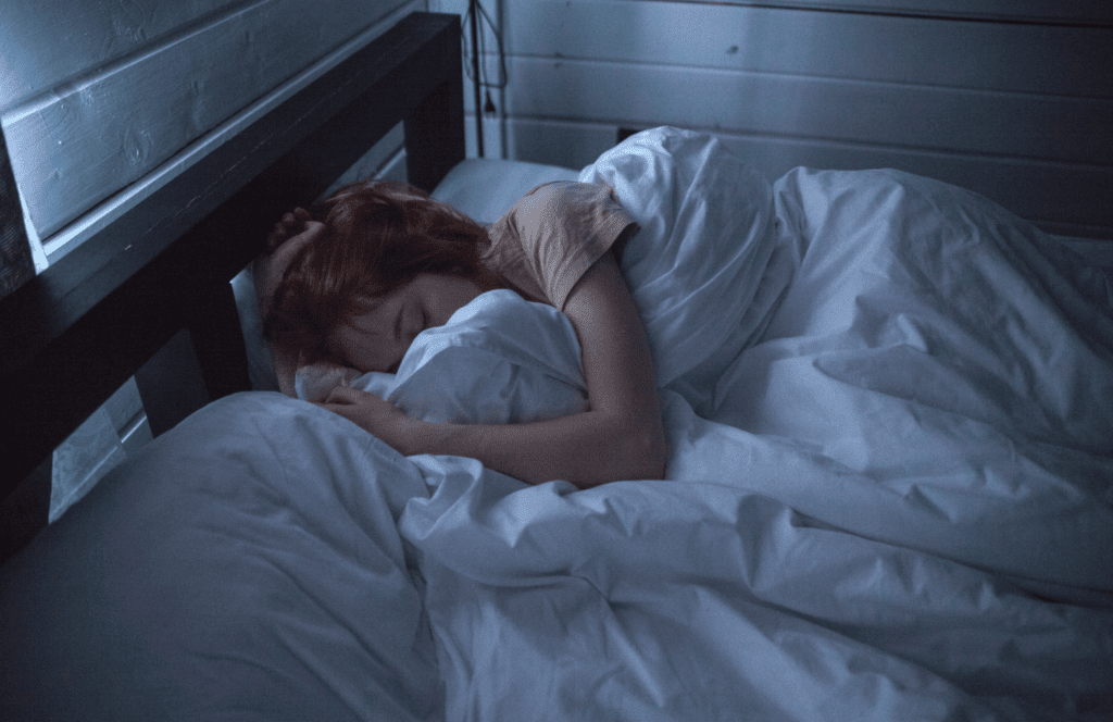 woman sleeping in a bed